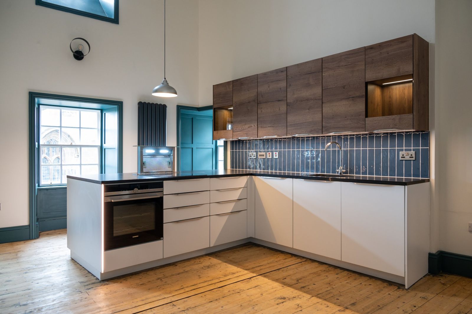 Fitted kitchen with original sash windows